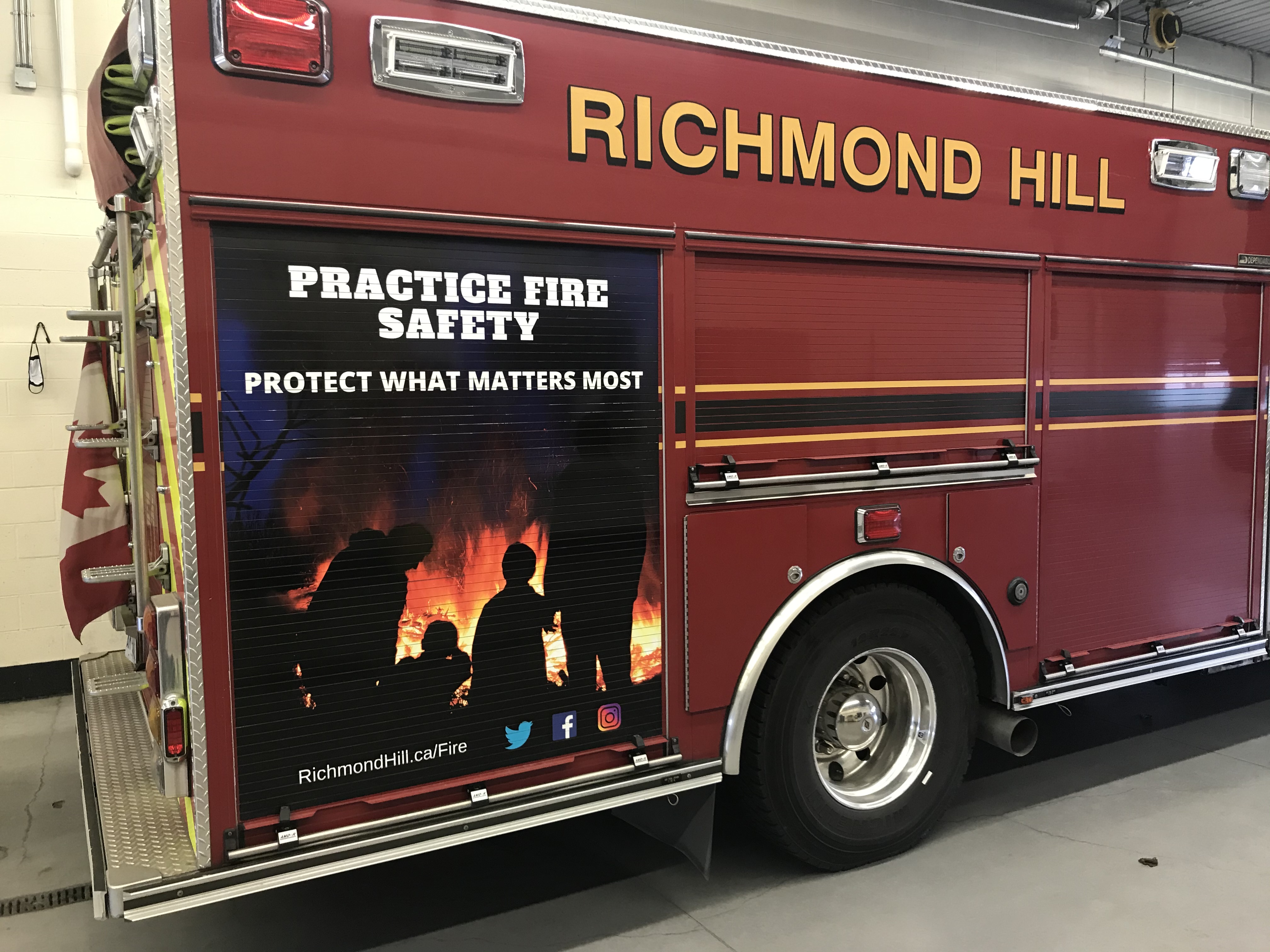 Practice Fire Safety message and graphic on fire truck
